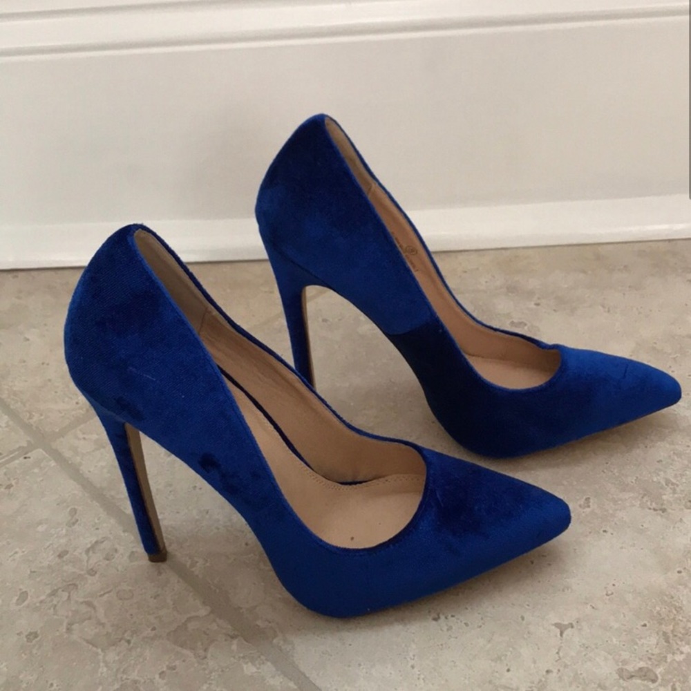 Red velvet heels .